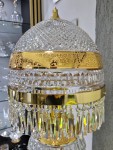 Détail de la décoration de la lampe : or 24 carats et gravure en profondeur