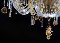 Glass seahorse at the bottom of the chandelier
