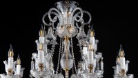 The upper part of the chandelier with cut glass bells