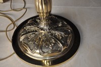 Detail of a golden brass lamp for placement on the ground 2