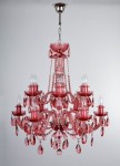 General view of a hanging colored chandelier with pink trimmings