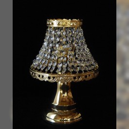 Lampe de table dorée faite de petites pierres de cristal