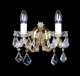 Glod 2-armed Theresian wall light on a wall with French crystal pendeloques
