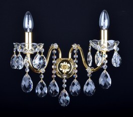 2 Arms brass crystal wall light with cut almonds and tubular arms