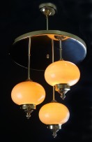 Lighted Art deco chandelier with three white balls