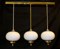 Art deco chandelier with balls next to each other