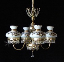 The 4 arms crystal chandelier with milk glass schirms