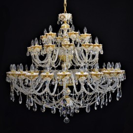 Representative 42-arm large white crystal chandelier with glass flowers on the gold base