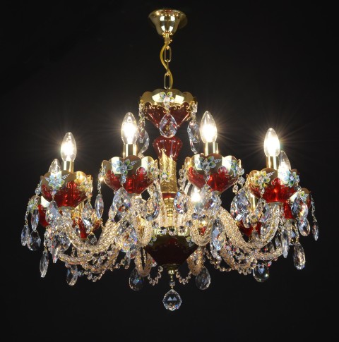 Lit Ruby red crystal chandlier to the living room