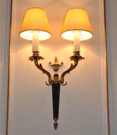 The cast brass wall light with 2 lampshades & violet painting