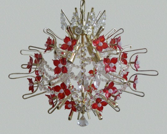 The design chandeliers decorated with hand made red glass flowers